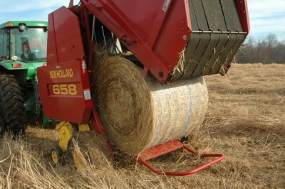 Hay bale coming out of machine